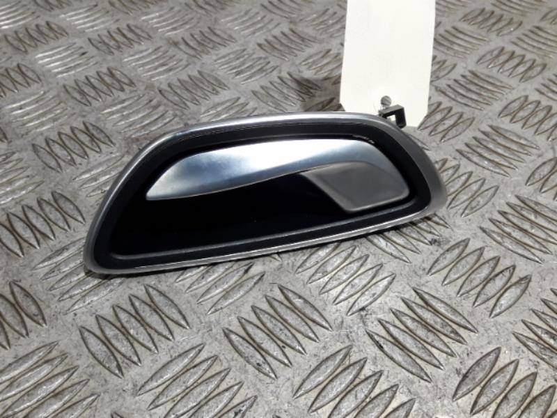 Poignee interieur avant gauche