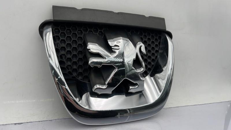 Simbolo della calandra PEUGEOT 308 1 SW PHASE 1 BREAK Diésel - 1