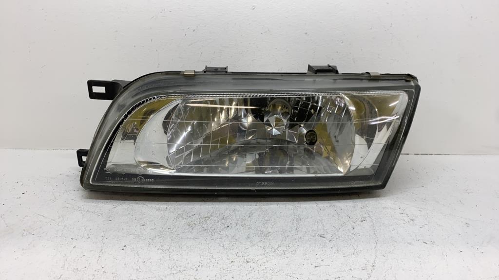 Optique avant principal gauche (feux)(phare) nissan almera 1 phase 2