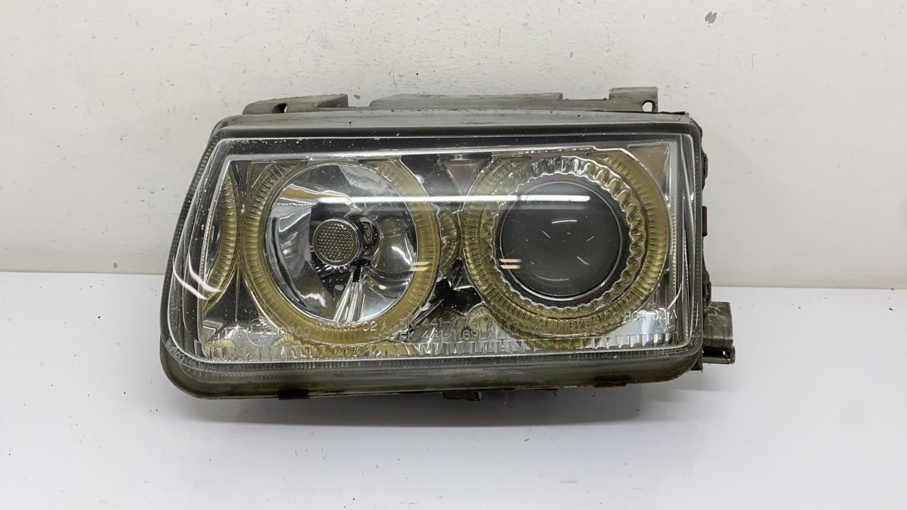 Optique avant principal gauche (feux)(phare) volkswagen polo 3 phase 1
