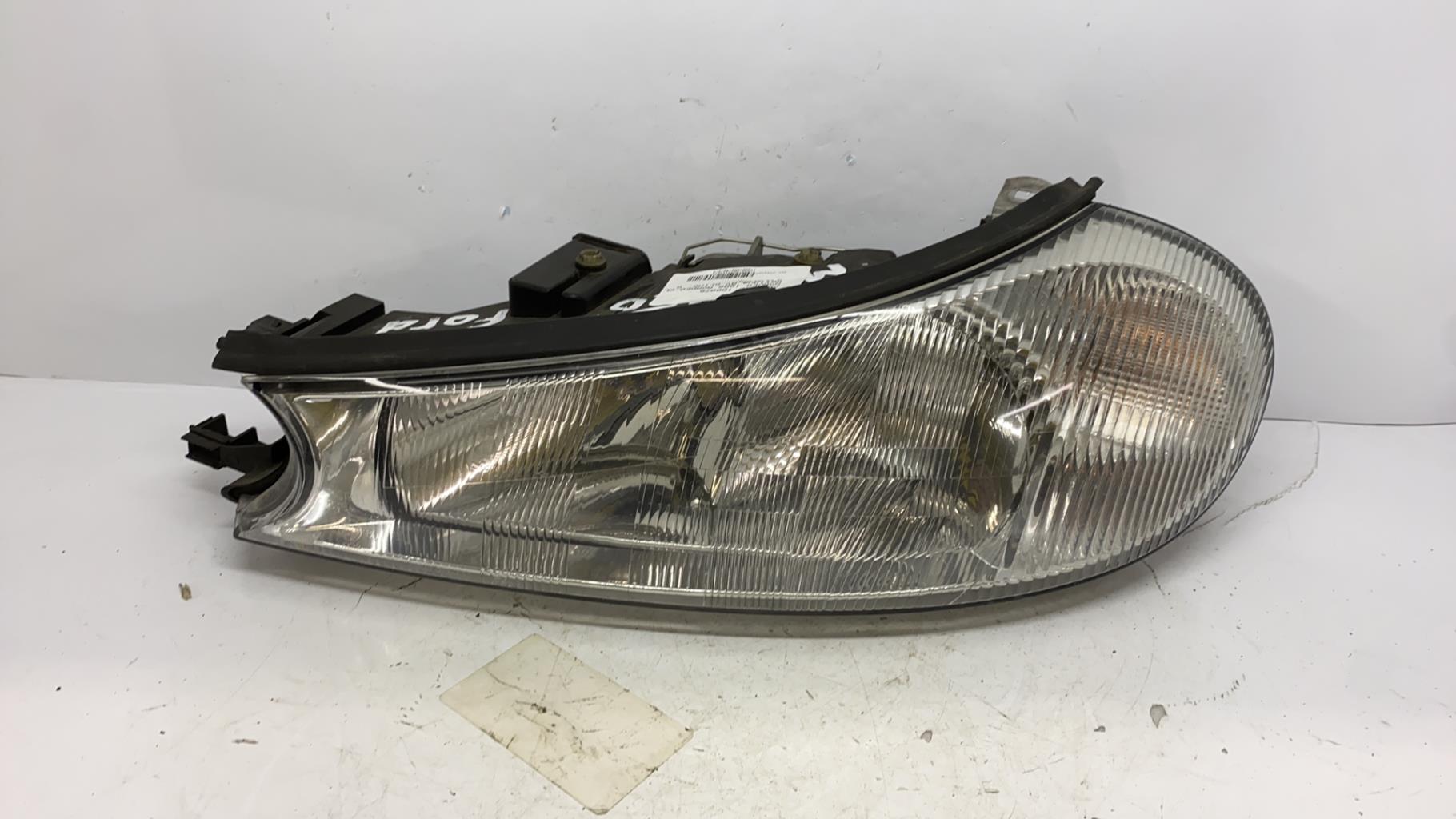 Optique avant principal gauche (feux)(phare) ford mondeo 1 phase 2 break