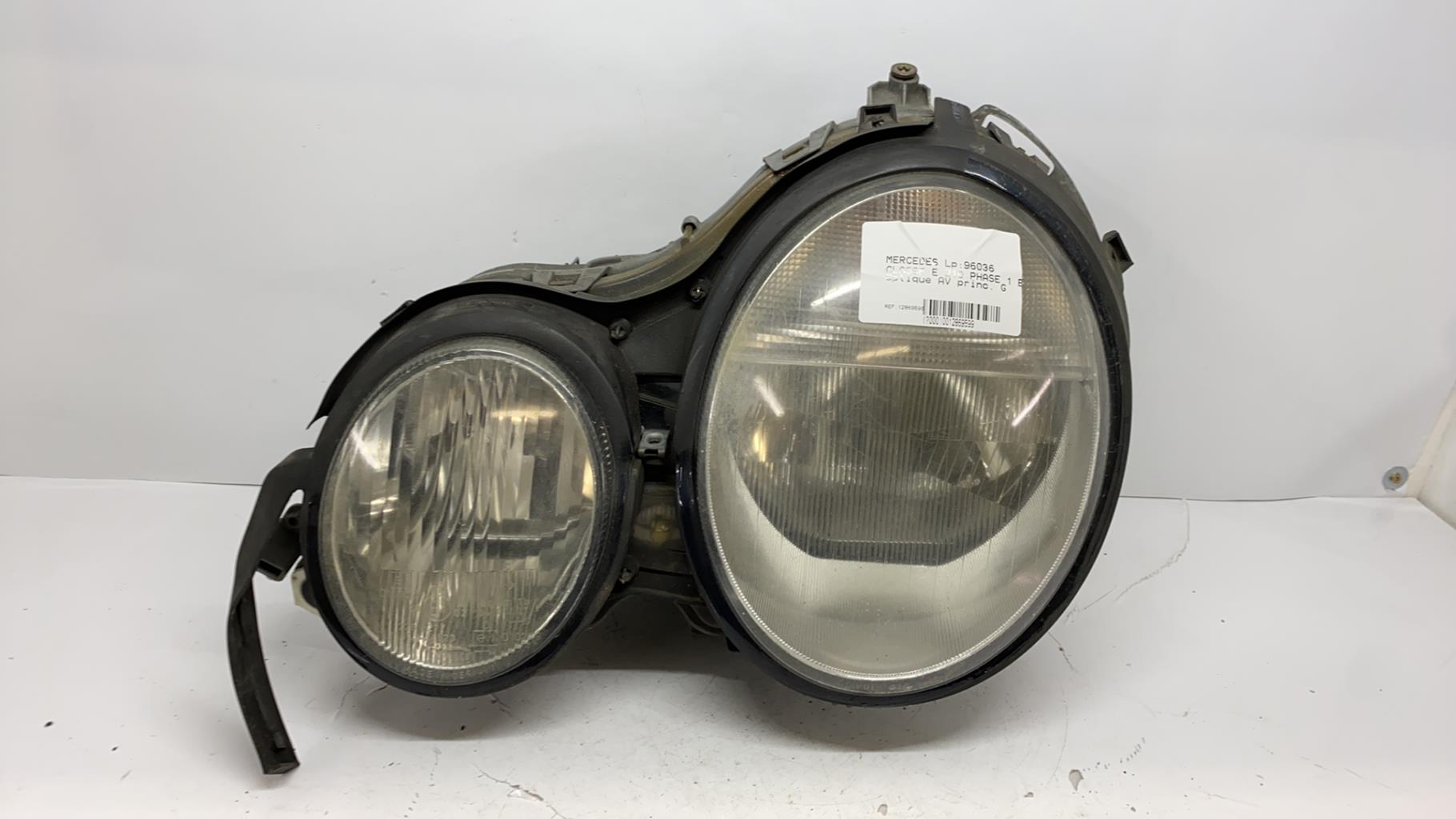 Optique avant principal gauche (feux)(phare) mercedes classe e 210 phase 1 break