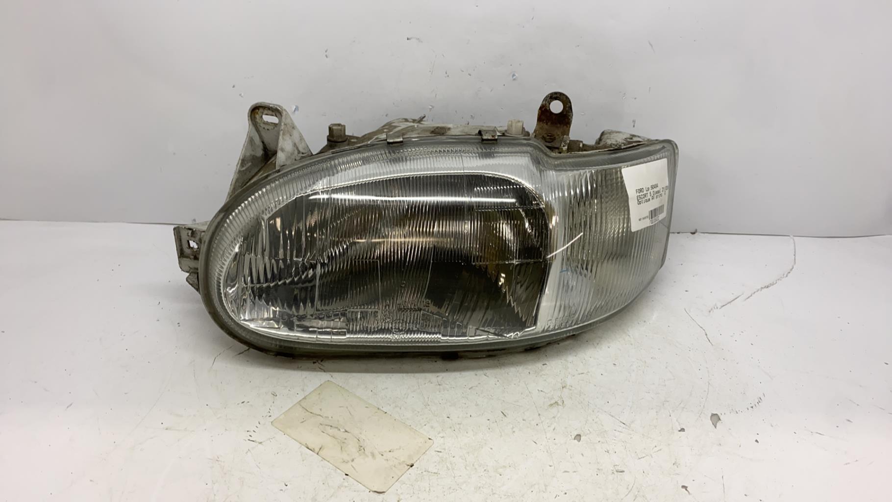 Optique avant principal gauche (feux)(phare) ford escort 6