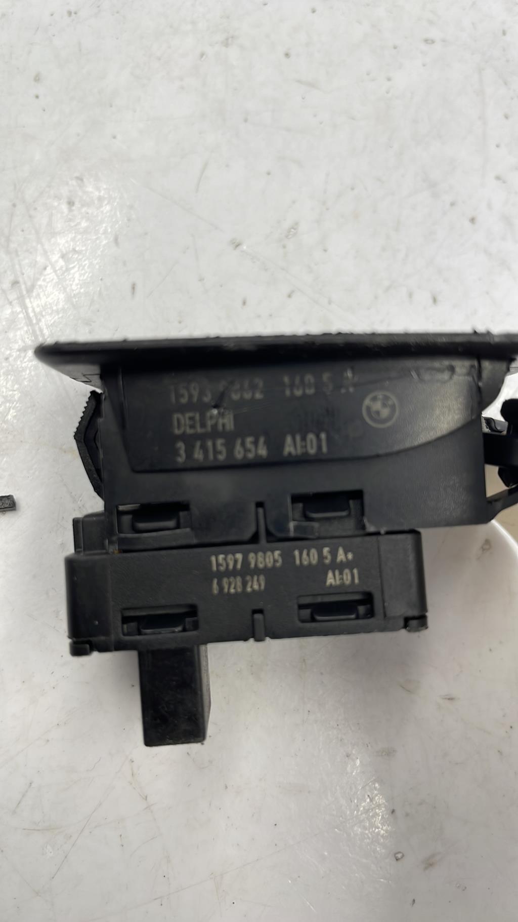 Interruttore lavacristalli posteriore sinistro BMW X3 E83 PHASE 1 Diésel - 1