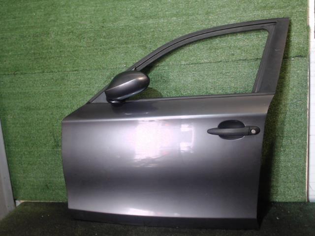 Porte Avant Gauche Pour BMW Série 1 E87 Phase 2 - Référence OEM 41515A2A381 - Couleur Noire - Occasion En Bon état