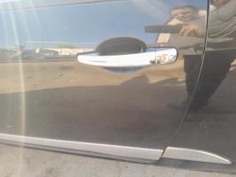 Poignee porte avant gauche