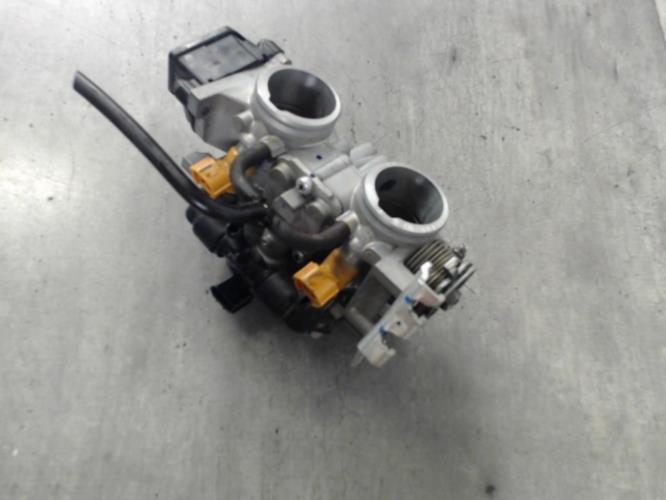 Illustration de Corps papillon injection HONDA