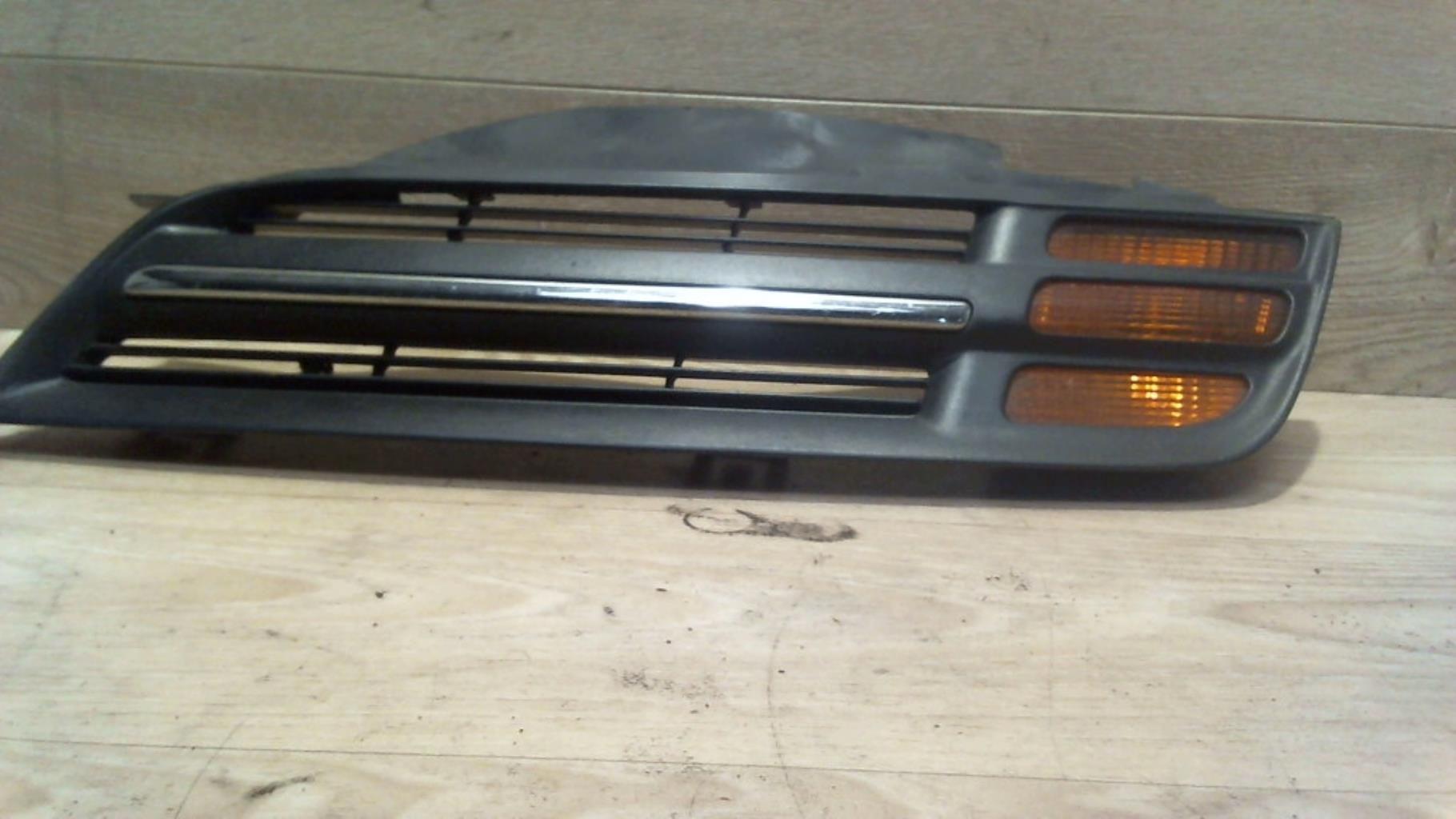 Grille de calandre gauche NISSAN MICRA 3 PHASE 1 Diesel - 1