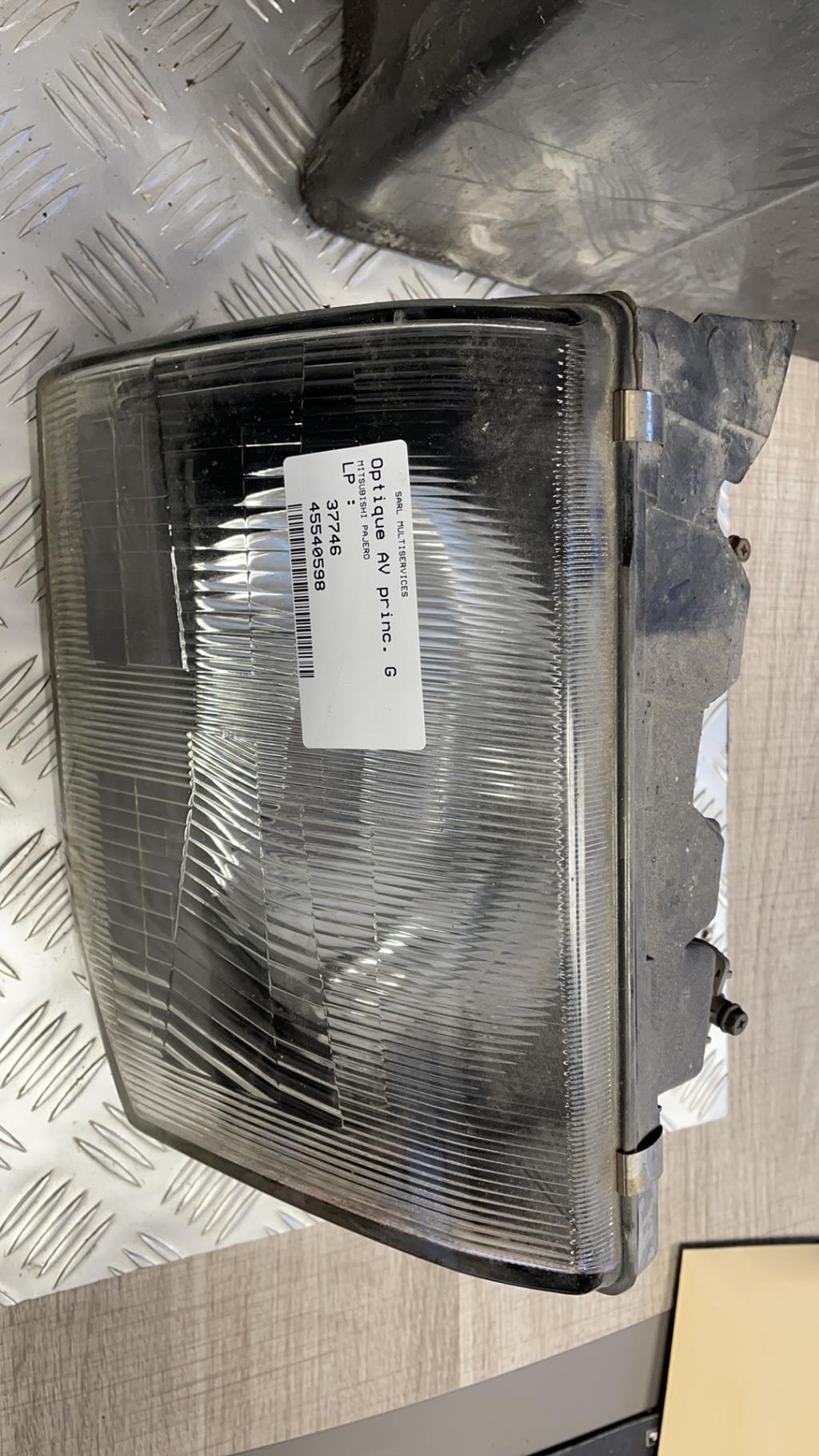 Gruppo ottico anteriore principale sinistro (luci)(faro) MITSUBISHI PAJERO 1  - 1